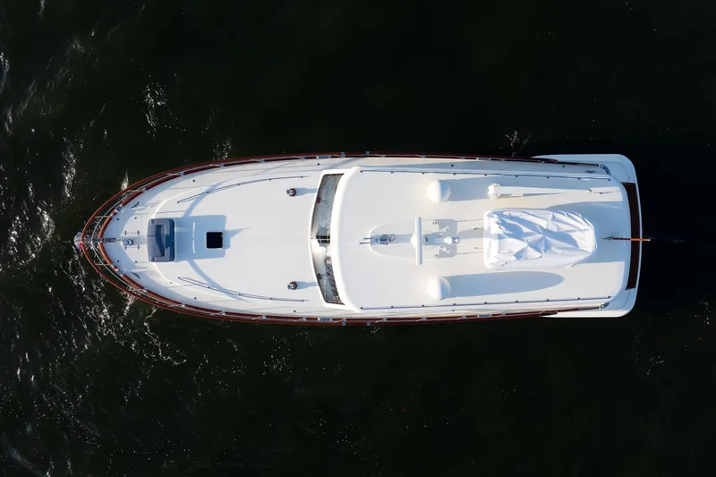 Mona Lisa Yacht Photos Pics Aerial view of 2025 Vicem 58 Classic yacht on dark water.