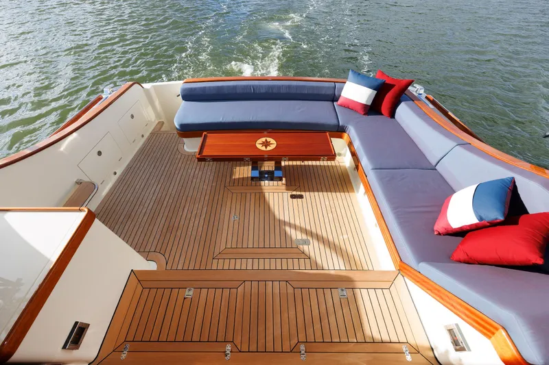 Mona Lisa Yacht Photos Pics Luxurious 2025 Vicem 58 Classic yacht deck with elegant seating and nautical decor.