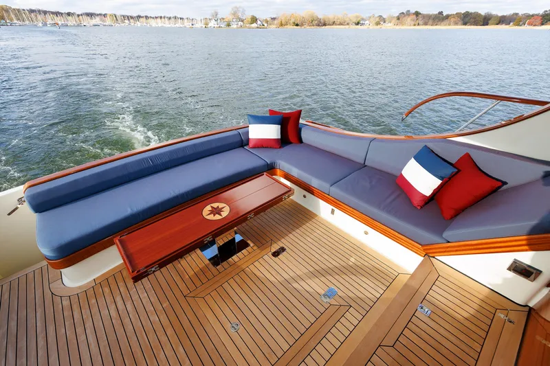Mona Lisa Yacht Photos Pics Luxurious 2025 Vicem 58 Classic yacht deck with elegant seating and scenic water view.