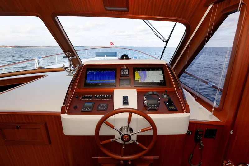 Mona Lisa Yacht Photos Pics Helm of 2025 Vicem 58 Classic yacht with navigation equipment and ocean view.