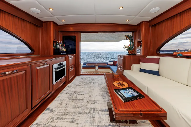 Mona Lisa Yacht Photos Pics Luxurious interior of 2025 Vicem 58 Classic yacht with elegant wood finishes and ocean view.