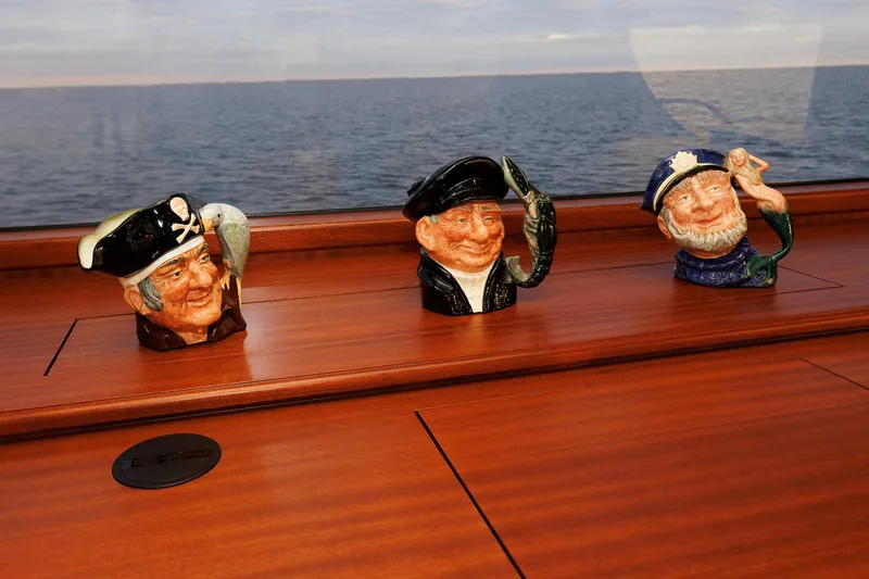 Mona Lisa Yacht Photos Pics Ceramic sailor mugs on Vicem 58 Classic yacht, 2025, with ocean view.