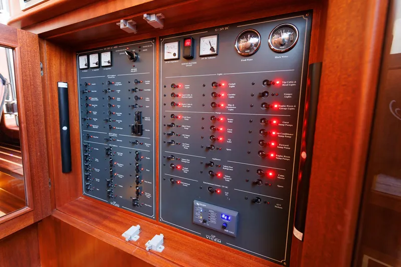 Mona Lisa Yacht Photos Pics Electrical control panel on 2025 Vicem 58 Classic yacht, featuring switches and gauges.