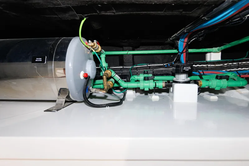 Mona Lisa Yacht Photos Pics Engine room of 2025 Vicem 58 Classic yacht, featuring water heater and piping system.