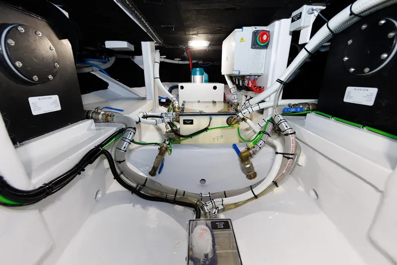 Mona Lisa Yacht Photos Pics Engine room of 2025 Vicem 58 Classic yacht, showcasing intricate piping and electrical systems.