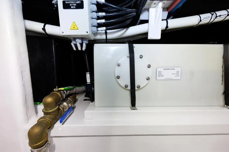 Mona Lisa Yacht Photos Pics Engine room of 2025 Vicem 58 Classic yacht with water tank and electrical box.