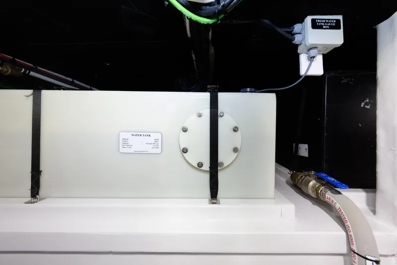 Mona Lisa Yacht Photos Pics Water tank system in 2025 Vicem 58 Classic yacht, featuring gauge box and secure fittings.