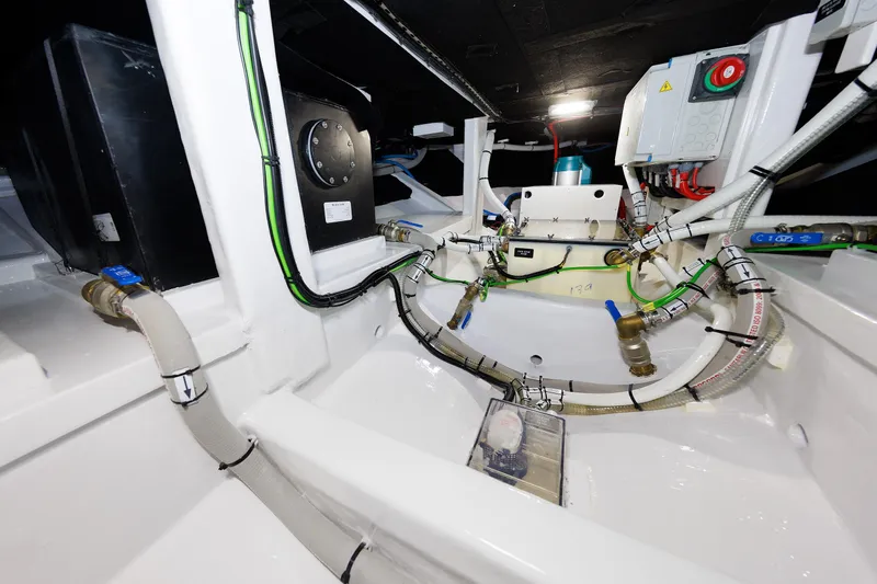 Mona Lisa Yacht Photos Pics Engine room of 2025 Vicem 58 Classic yacht, showcasing intricate piping and electrical systems.