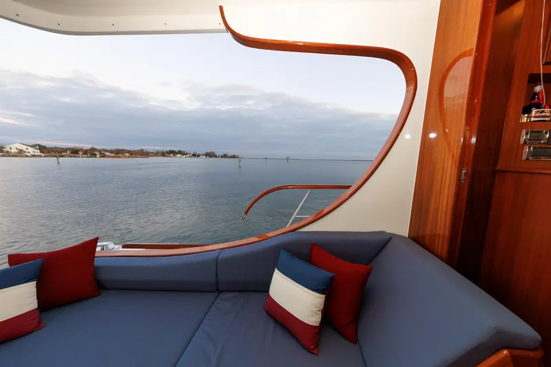 Mona Lisa Yacht Photos Pics Luxurious interior of 2025 Vicem 58 Classic yacht with scenic ocean view.