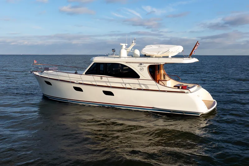 Mona Lisa Yacht Photos Pics 2025 Vicem 58 Classic yacht cruising on open water under a clear sky.