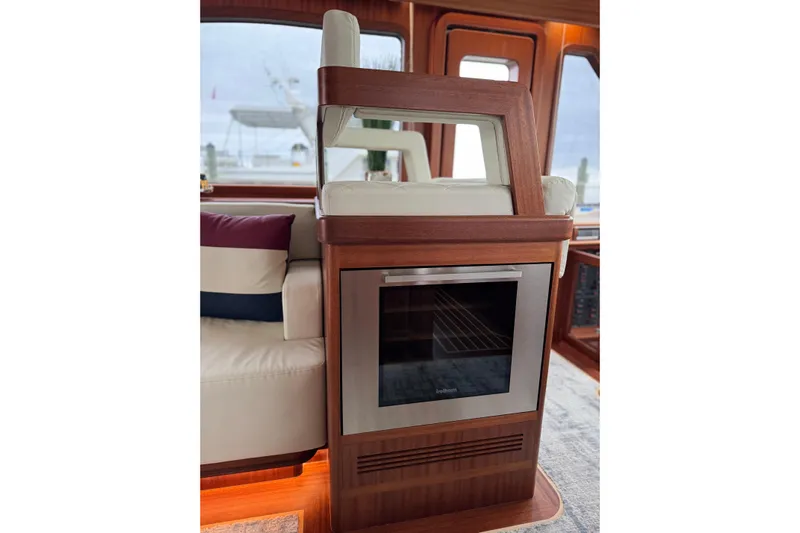 Mona Lisa Yacht Photos Pics Luxurious interior of 2025 Vicem 58 Classic yacht with elegant wood finish.