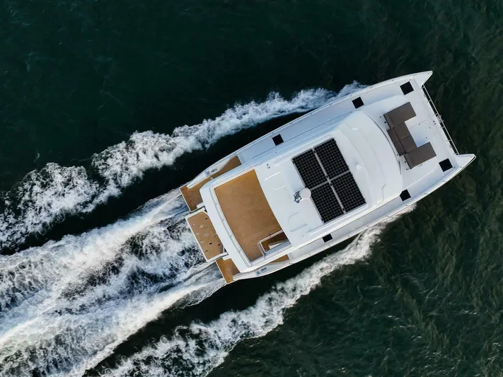 53f Iliad 2025 Yacht Photos Pics Aerial view of ILIAD 53F yacht cruising on water, 2026 model.