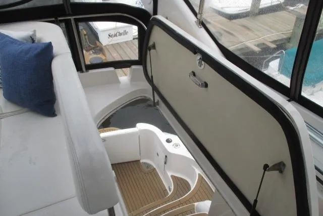 Pho-king-gross Yacht Photos Pics 2002 Sea Ray 400 Sedan Bridge interior with stairs and seating area.