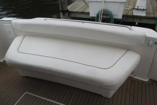 Pho-king-gross Yacht Photos Pics White cushioned seating on 2002 Sea Ray 400 Sedan Bridge yacht deck.