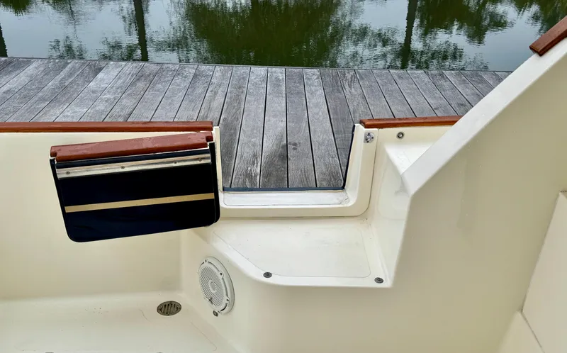 Linda Lou Yacht Photos Pics Legacy 36 boat, 2018 model, showing deck entry with wooden dock in background.