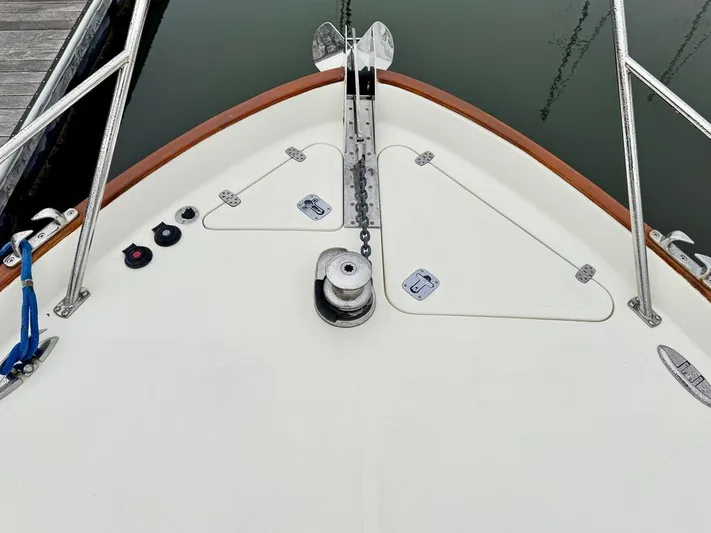 Linda Lou Yacht Photos Pics Bow of a 2018 Legacy 36 boat with anchor chain and deck fittings.