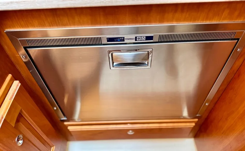 Linda Lou Yacht Photos Pics Stainless steel dishwasher in a 2018 Legacy 36 kitchen interior.