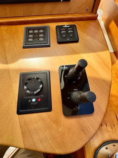 Linda Lou Yacht Photos Pics Control panel of a 2018 Legacy 36 boat with joystick and electronic controls.