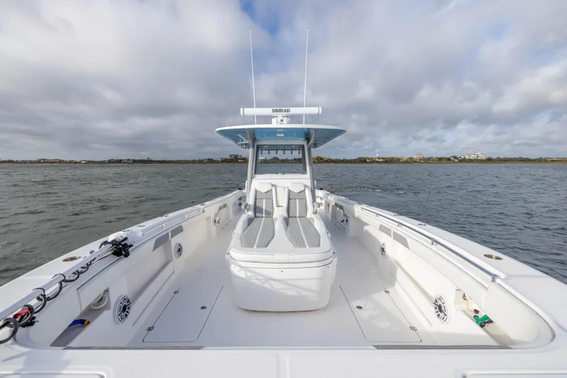 Nordic Blue Yacht Photos Pics 2024 Invincible 35 Catamaran on open water, showcasing spacious deck and seating.