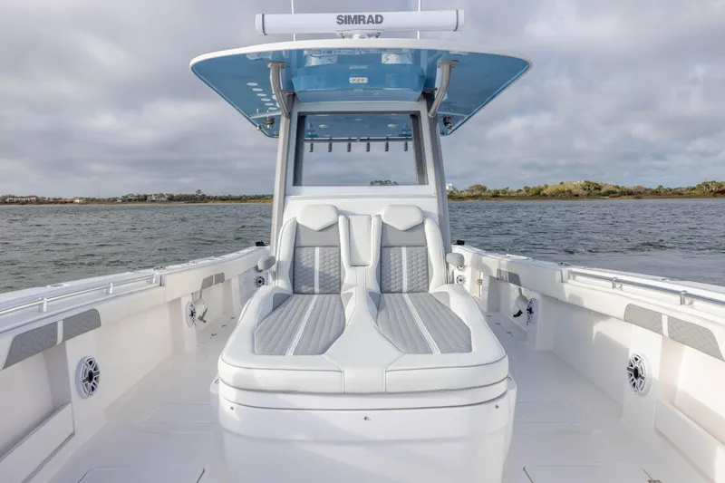 Nordic Blue Yacht Photos Pics 2024 Invincible 35 Catamaran with sleek seating and modern design on open water.