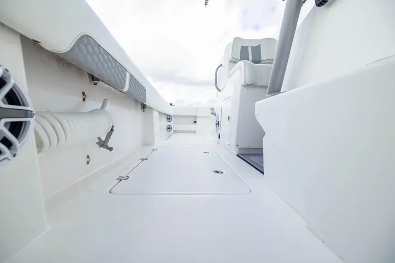 Nordic Blue Yacht Photos Pics 2024 Invincible 35 Catamaran interior, showcasing sleek white deck and seating.