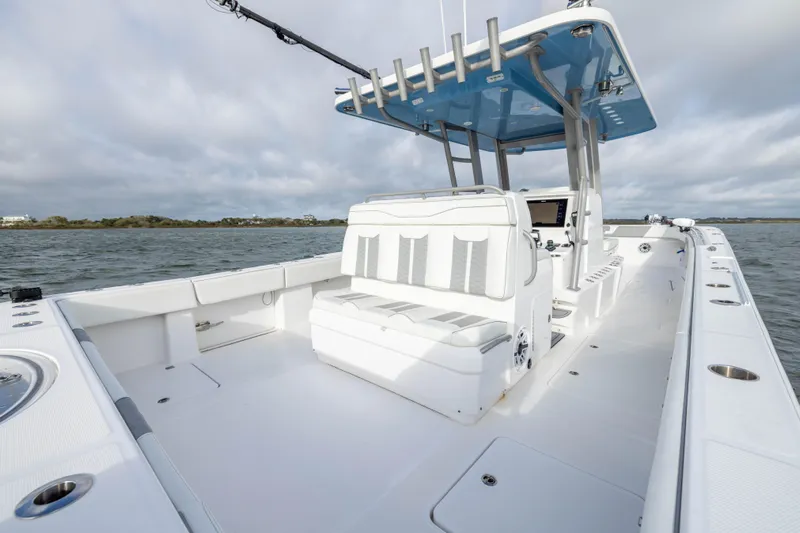 Nordic Blue Yacht Photos Pics 2024 Invincible 35 Catamaran with sleek seating and modern helm on open water.