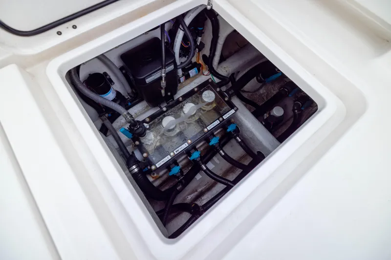 Nordic Blue Yacht Photos Pics Engine compartment of 2024 Invincible 35 Catamaran, showcasing intricate mechanical components.