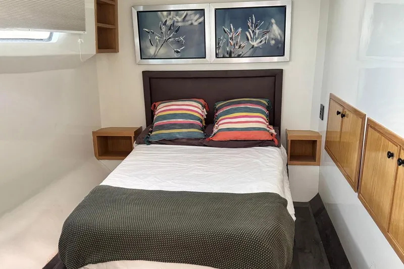 Pilar X Yacht Photos Pics Interior of Leeuwin 55 yacht, 2024, featuring cozy bedroom.