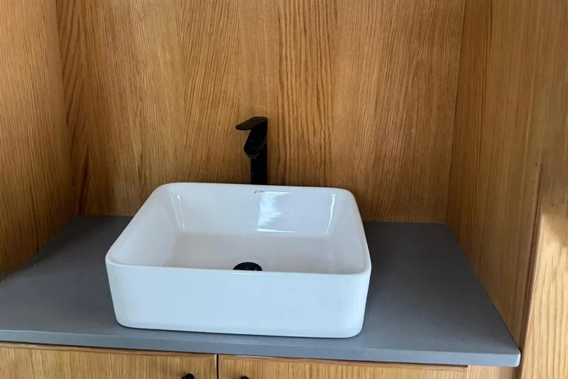 Pilar X Yacht Photos Pics Modern rectangular sink with black faucet, Leeuwin 55, 2024.