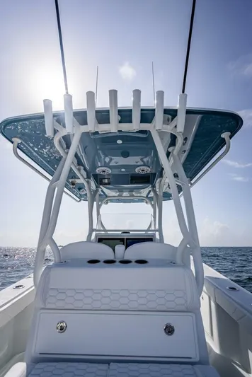 34 Offshore Yacht Photos Pics 2025 Yellowfin 34 Offshore boat, featuring sleek design and modern amenities, on open water.