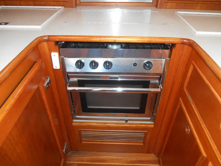 Balmy Yacht Photos Pics Galley kitchen with oven in 1999 Grand Banks 38 Eastbay EX yacht.