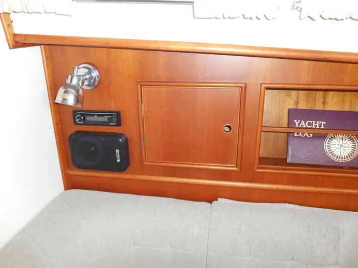 Balmy Yacht Photos Pics Interior of 1999 Grand Banks 38 Eastbay EX with wood paneling and yacht log book.