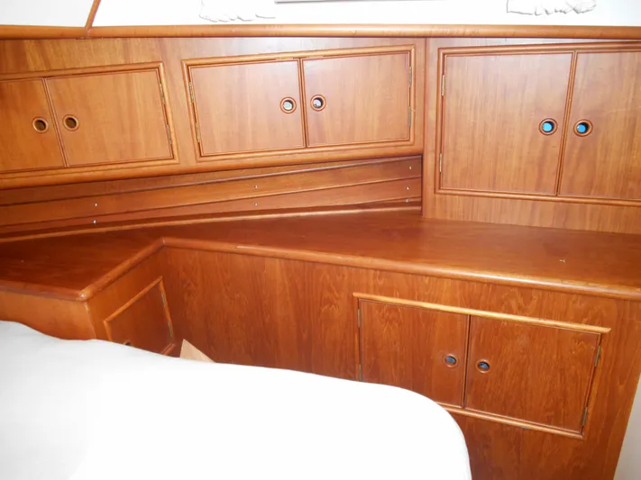 Balmy Yacht Photos Pics 1999 Grand Banks 38 Eastbay EX interior with wooden cabinetry and storage.