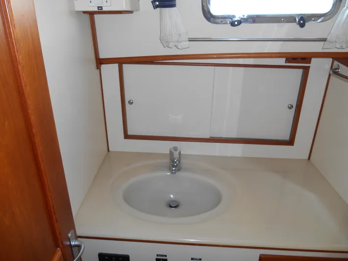 Balmy Yacht Photos Pics Bathroom sink area in 1999 Grand Banks 38 Eastbay EX yacht.