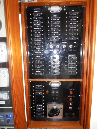 Balmy Yacht Photos Pics Electrical panel of 1999 Grand Banks 38 Eastbay EX boat, featuring switches and controls.