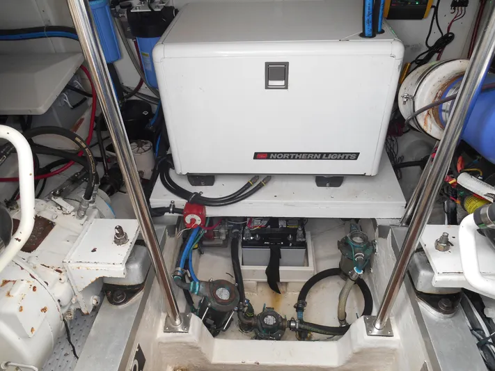 Balmy Yacht Photos Pics Engine room of 1999 Grand Banks 38 Eastbay EX with Northern Lights generator.