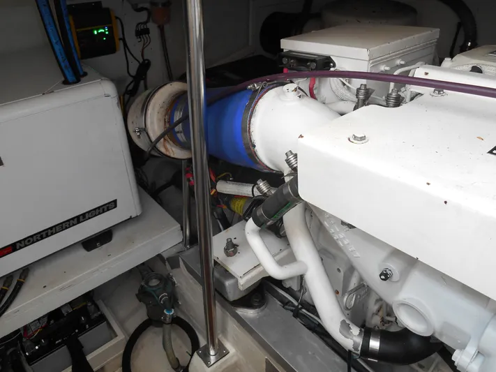 Balmy Yacht Photos Pics Engine room of 1999 Grand Banks 38 Eastbay EX with visible machinery and components.