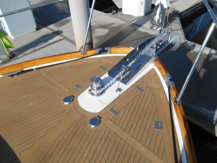 Balmy Yacht Photos Pics 1999 Grand Banks 38 Eastbay EX bow with teak deck and anchor chain.