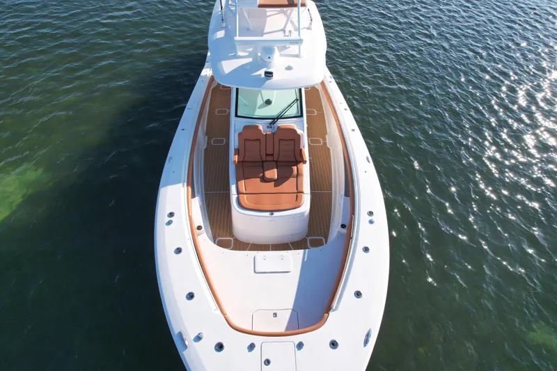  Yacht Photos Pics 2019 Scout 420 LXF boat on water, aerial view showcasing deck and seating.