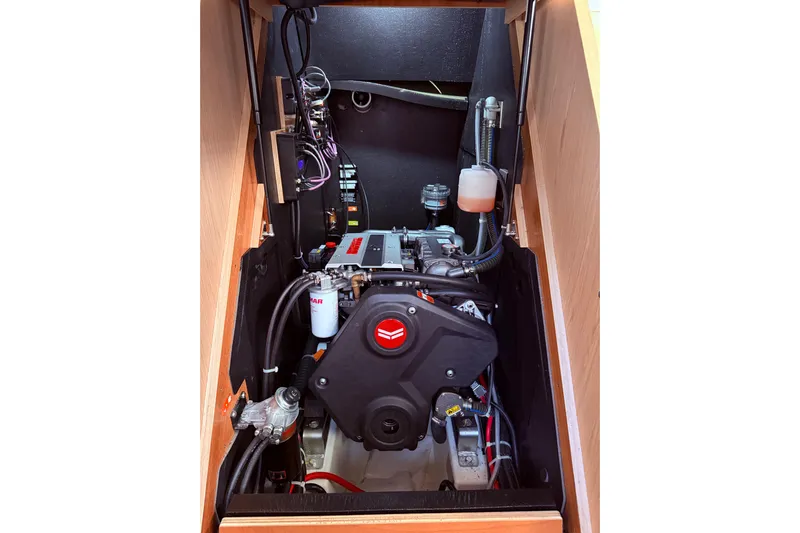 One Five Yacht Photos Pics Engine compartment of 2022 Beneteau Oceanis Yacht 54, showcasing modern marine engineering.