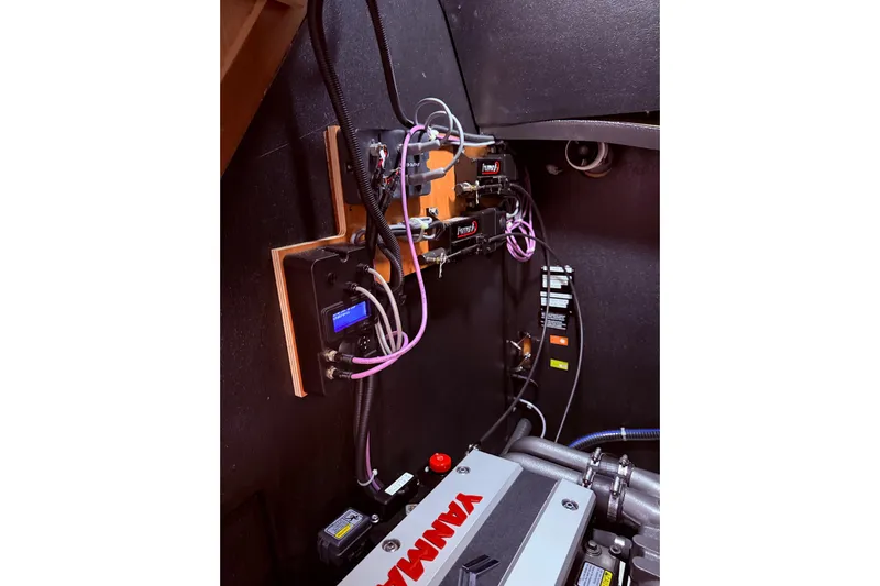 One Five Yacht Photos Pics Engine room of 2022 Beneteau Oceanis Yacht 54 with Yanmar components and wiring.