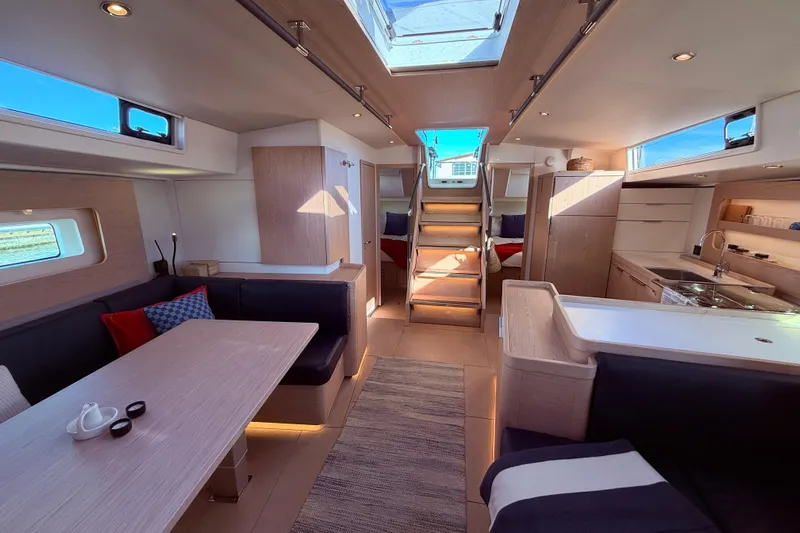 One Five Yacht Photos Pics Luxurious interior of 2022 Beneteau Oceanis Yacht 54, featuring modern design and spacious layout.