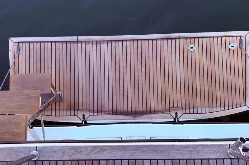 One Five Yacht Photos Pics Beneteau Oceanis Yacht 54, 2022, teak deck view, elegant marine craftsmanship.