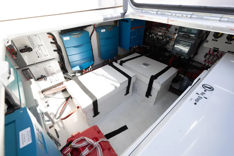 Second Wind Yacht Photos Pics Electrical compartment of 2022 Lagoon 52 F yacht with batteries and wiring systems.