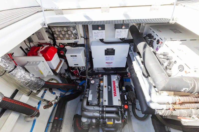 Second Wind Yacht Photos Pics Engine room of 2022 Lagoon 52 F yacht with Yanmar engine and electrical components.