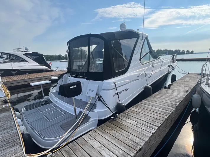  Yacht Photos Pics 2009 Four Winns 378 Vista yacht docked at marina under clear sky.