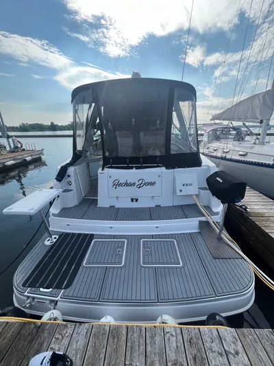  Yacht Photos Pics 2009 Four Winns 378 Vista yacht docked at marina under blue sky.