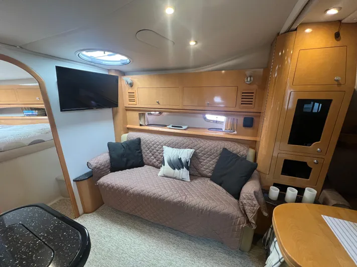  Yacht Photos Pics 2009 Four Winns 378 Vista interior with cozy seating, TV, and modern amenities.