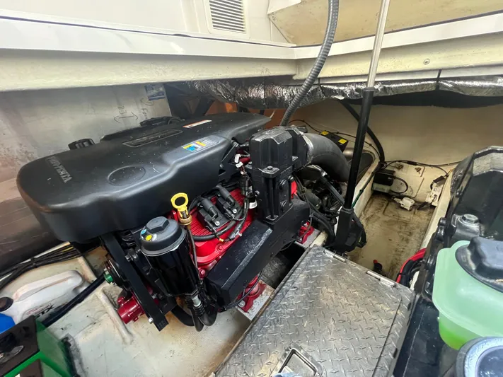  Yacht Photos Pics Engine compartment of 2009 Four Winns 378 Vista boat, showcasing detailed mechanical components.