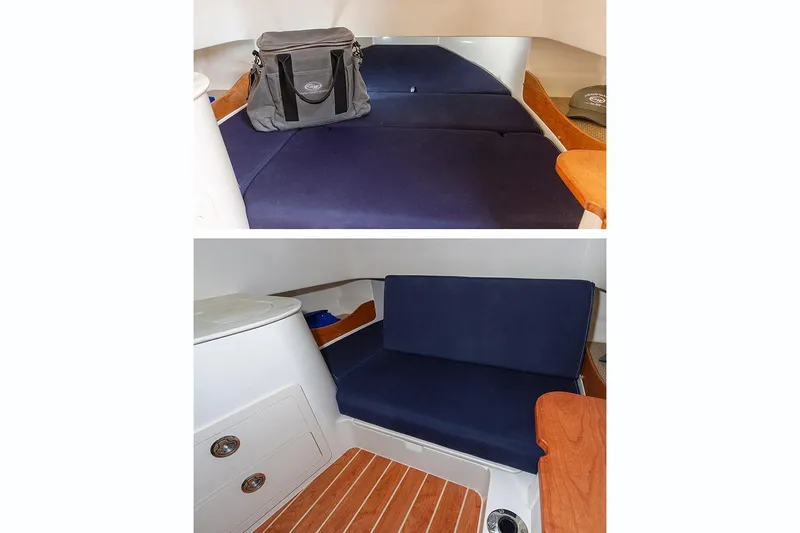  Yacht Photos Pics Manufacturer Provided Image: 2020 Grady-White Canyon 336 cabin interior with blue seating and wooden accents.